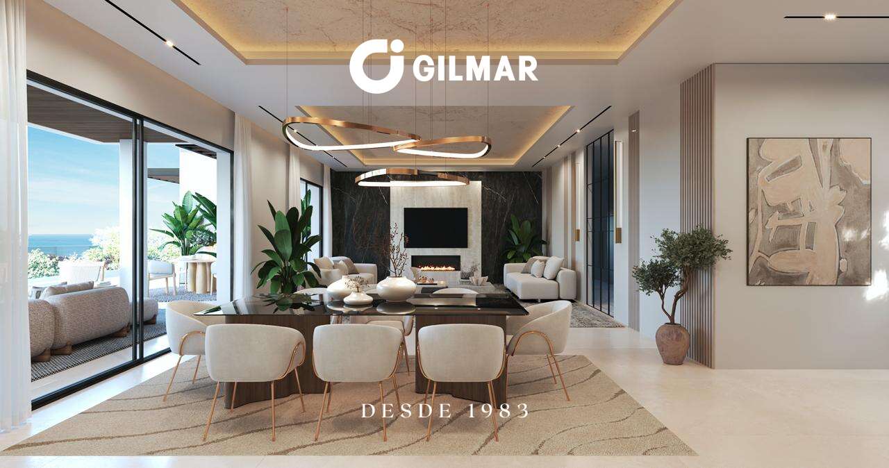 Comedor elegante con mesa oscura, lámpara de diseño, plantas decorativas y acceso a terraza con vistas.